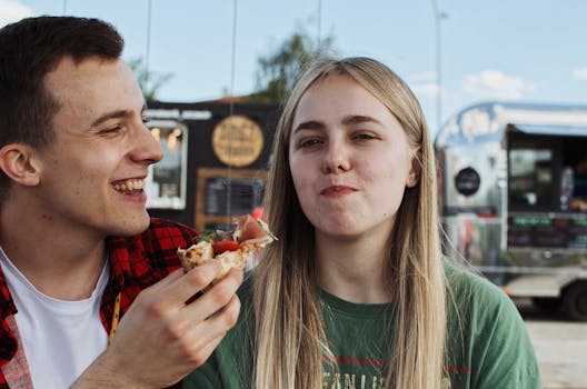 happy traveler enjoying local food