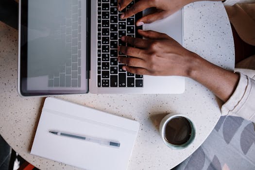 blogging workspace with notepad and coffee