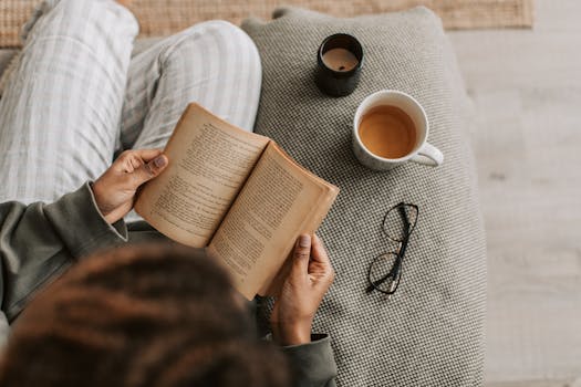 a cozy reading nook with a cup of tea